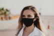 žena s maskom za lice zbog ponovnog širenja koronavirusa